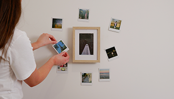 Sticking pictures to wall for seasonal decorations